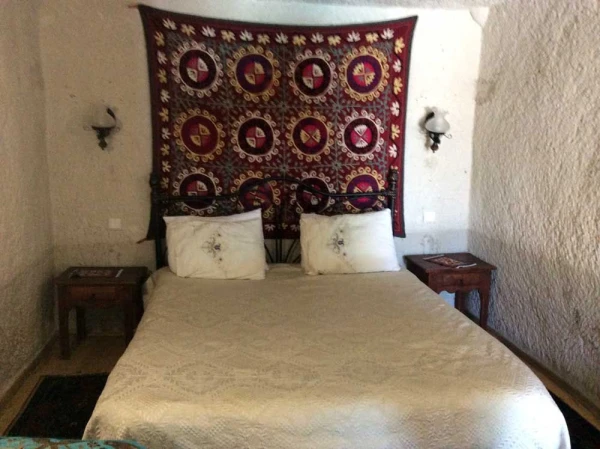 Комнаты отеля Local Cave House
