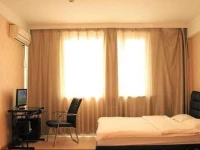 Fushun Woniu Apartment XinhuaTesco 