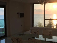 Luxury Apt in Konak Sea Side with a Sea front view and a private beach