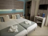  115 The Strand Hotel and Suites