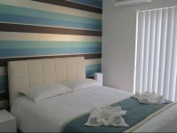  115 The Strand Suites